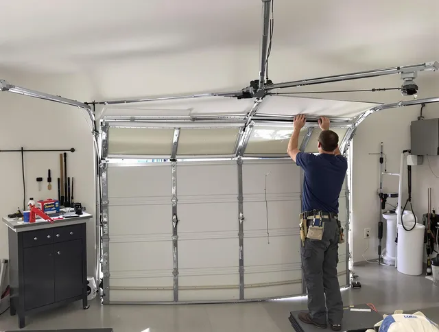 Hemet Garage Door Repair specialist performing precise section replacement on Hemet garage door